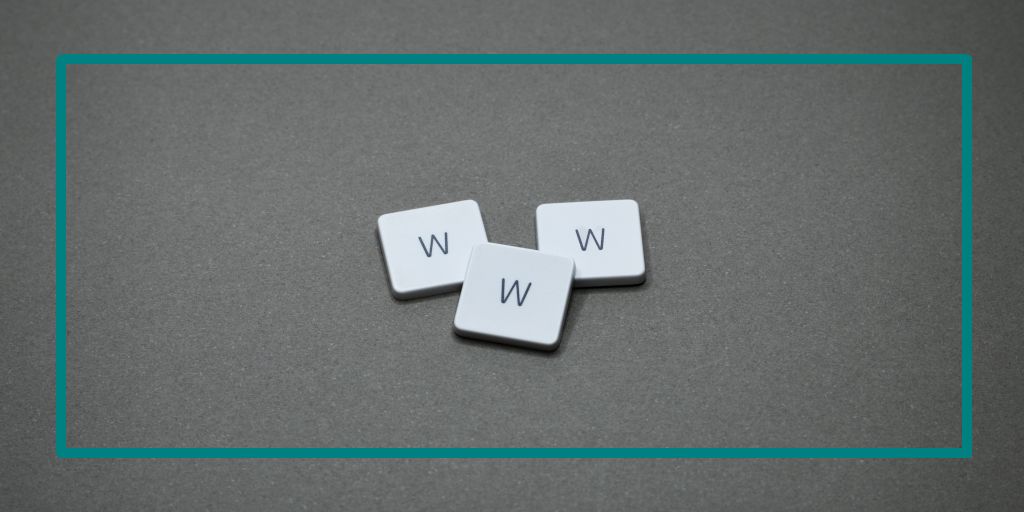 Three tiles on a grey background that say W. W. W.
