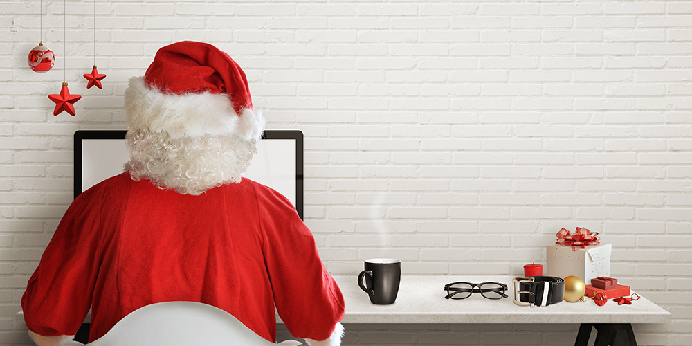 Santa sitting at a desk