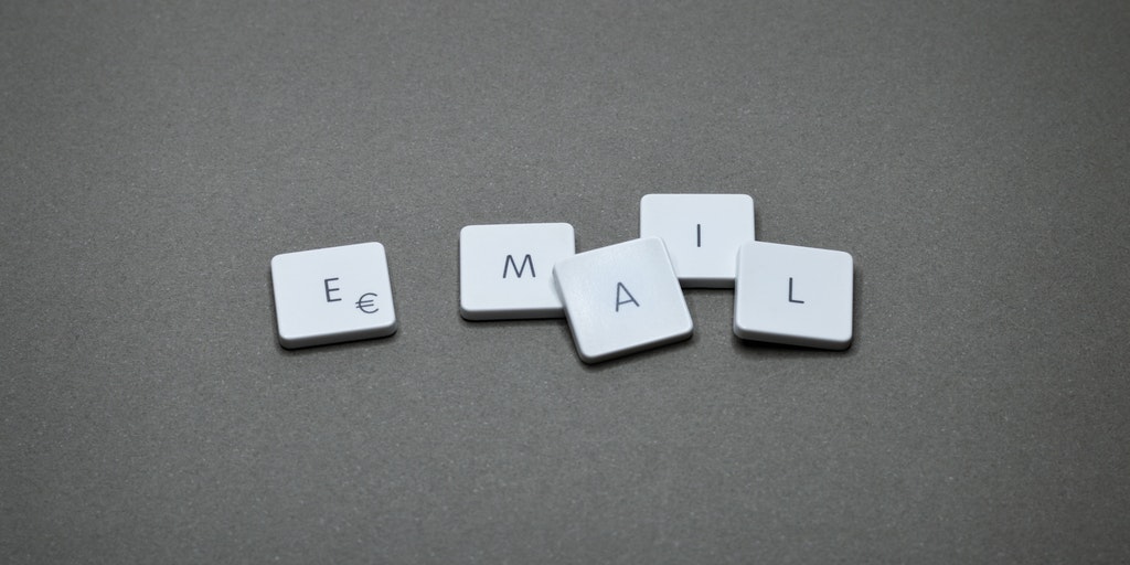 How to buy a domain email address - Letters on a grey background that spell out email.