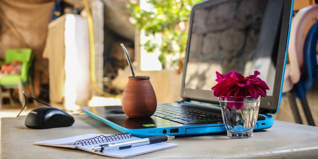 Work from home remotely - a laptop, a tropical drink and a pad of paper are all you really need right?